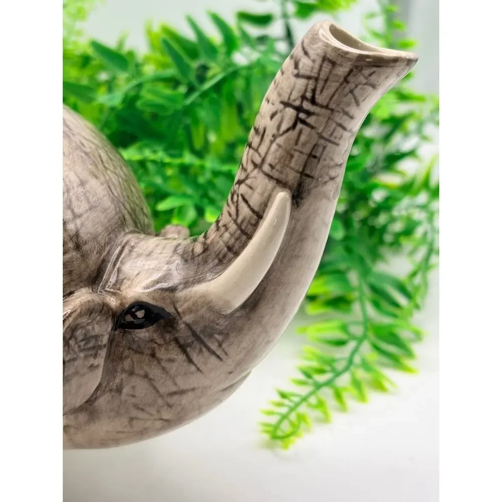 Vintage world market elephant tea pot.